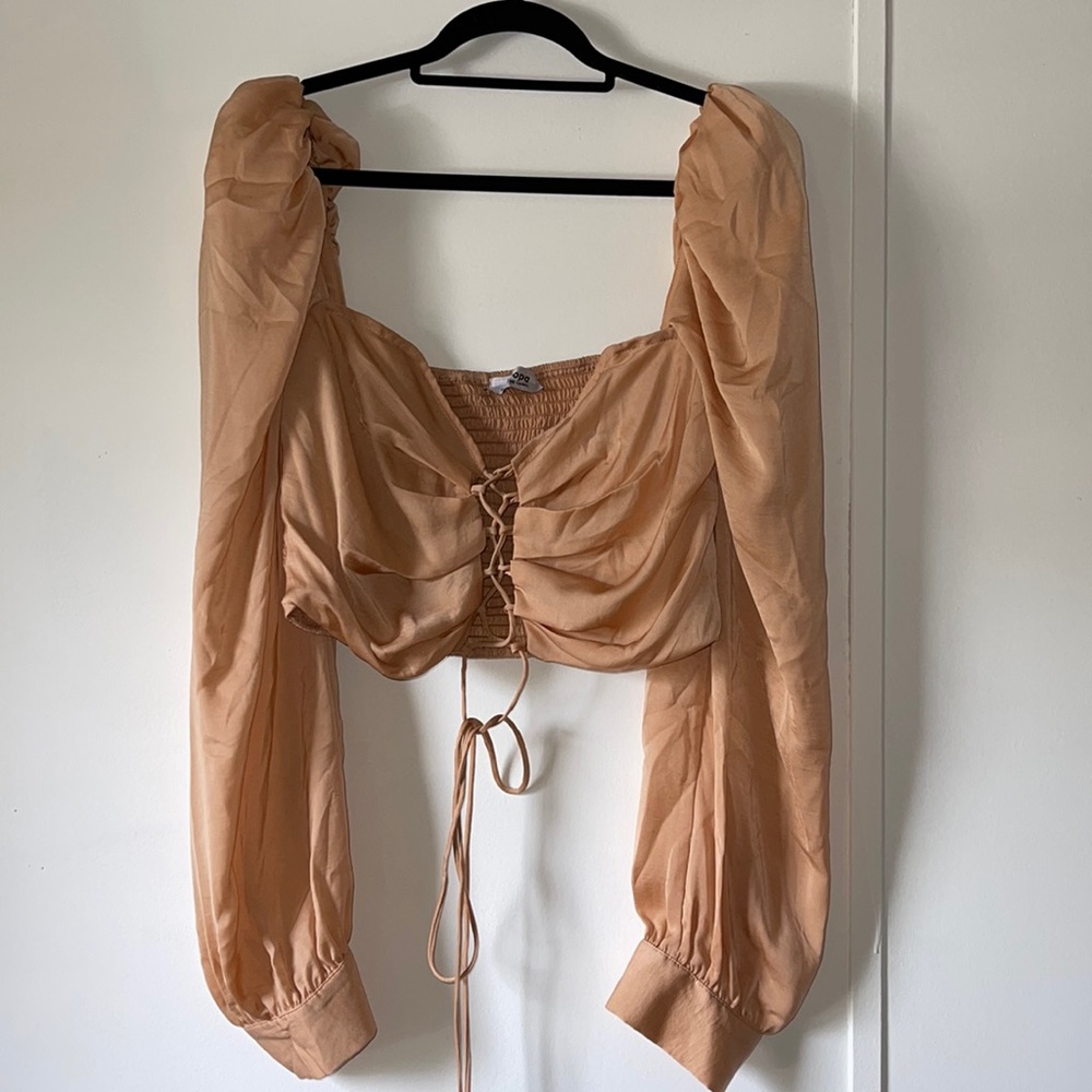 Peach color going out crop long sleeve top. Top is a 1XL from shop MissLola.